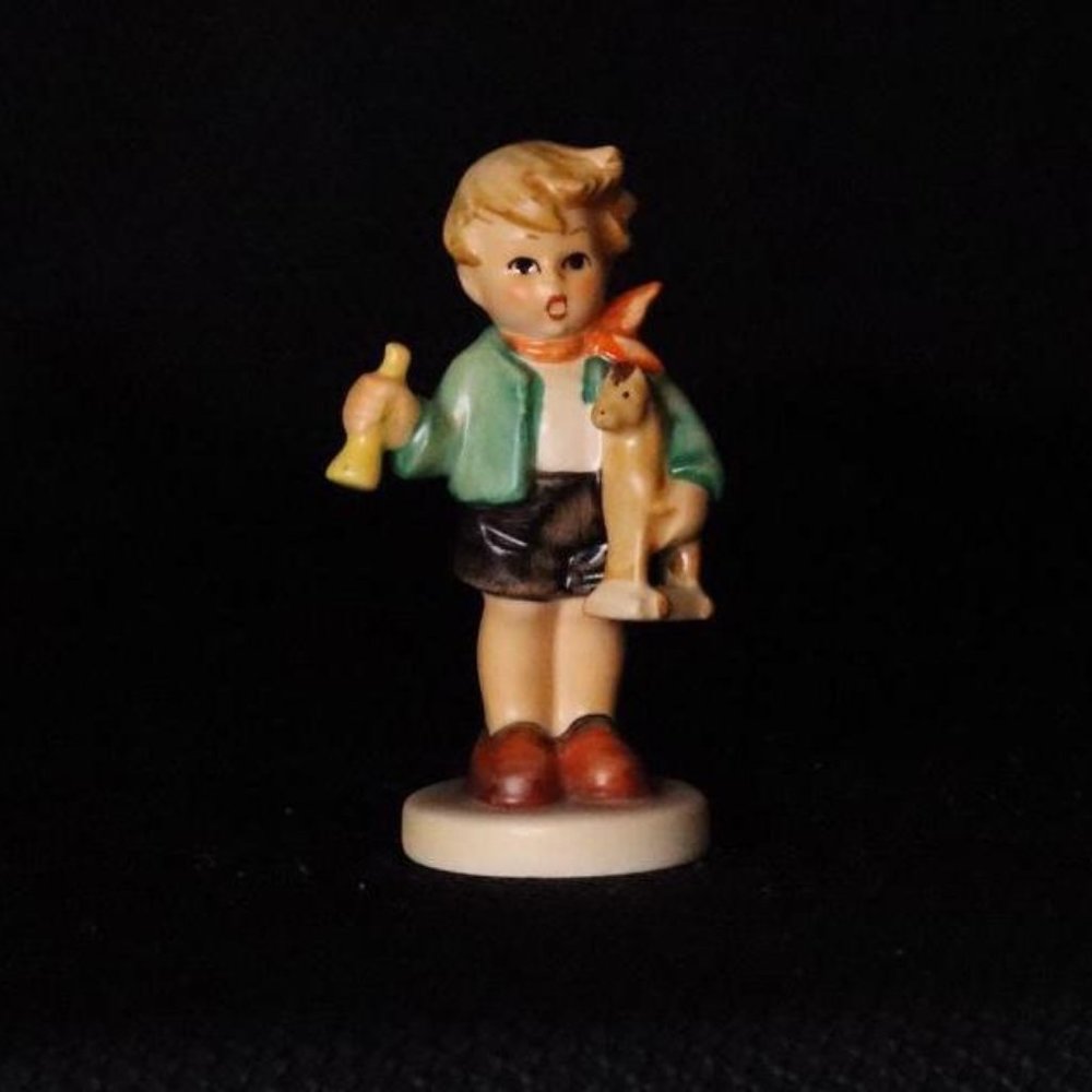 Boy w/ trumpet and toy horse - Vintage Hummel